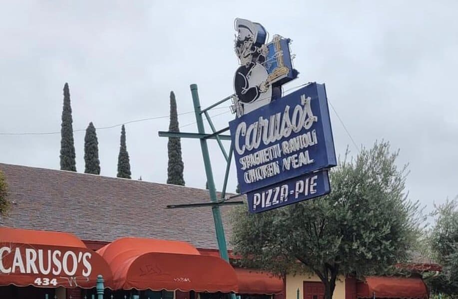 Strong winds knock over Caruso’s Italian Restaurant’s iconic sign