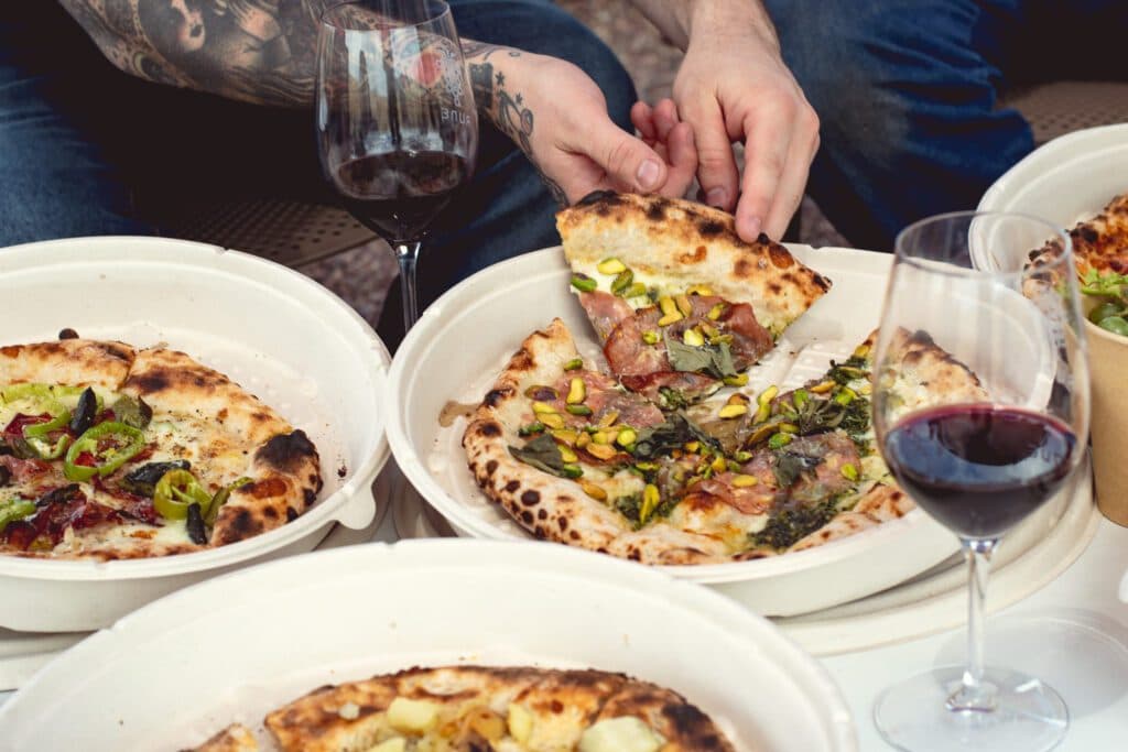 Eating Pronghorn Pizza to-go at Rune Wines (Photo by Jackie Tran)