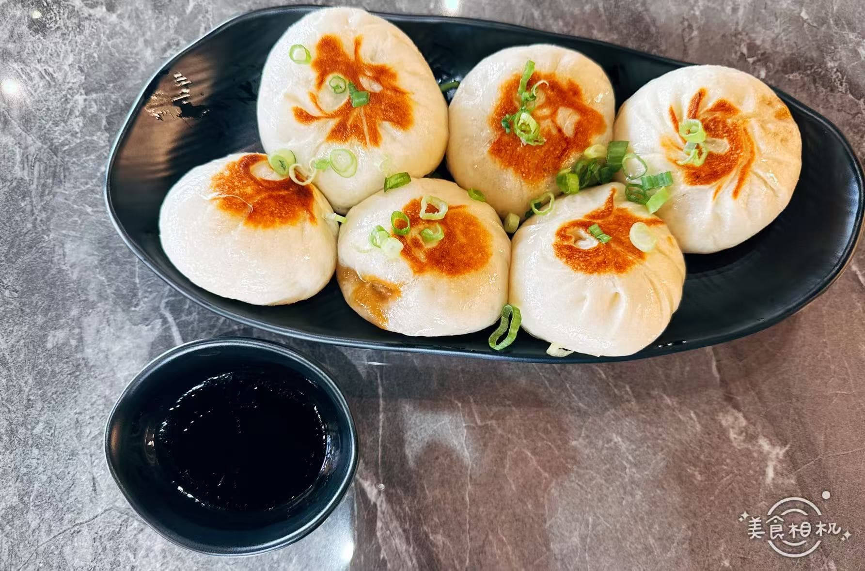 Tucson's 100 Boil Pot & Grill blends hot pot with pan-fried buns