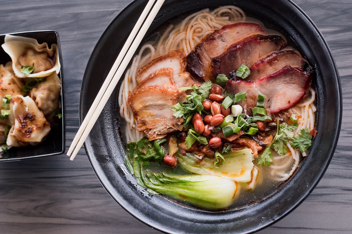 Chaoshou Dumplings and the Guilin Spicy & Sour noodle soup at Noodleholics (Credit: Jackie Tran)