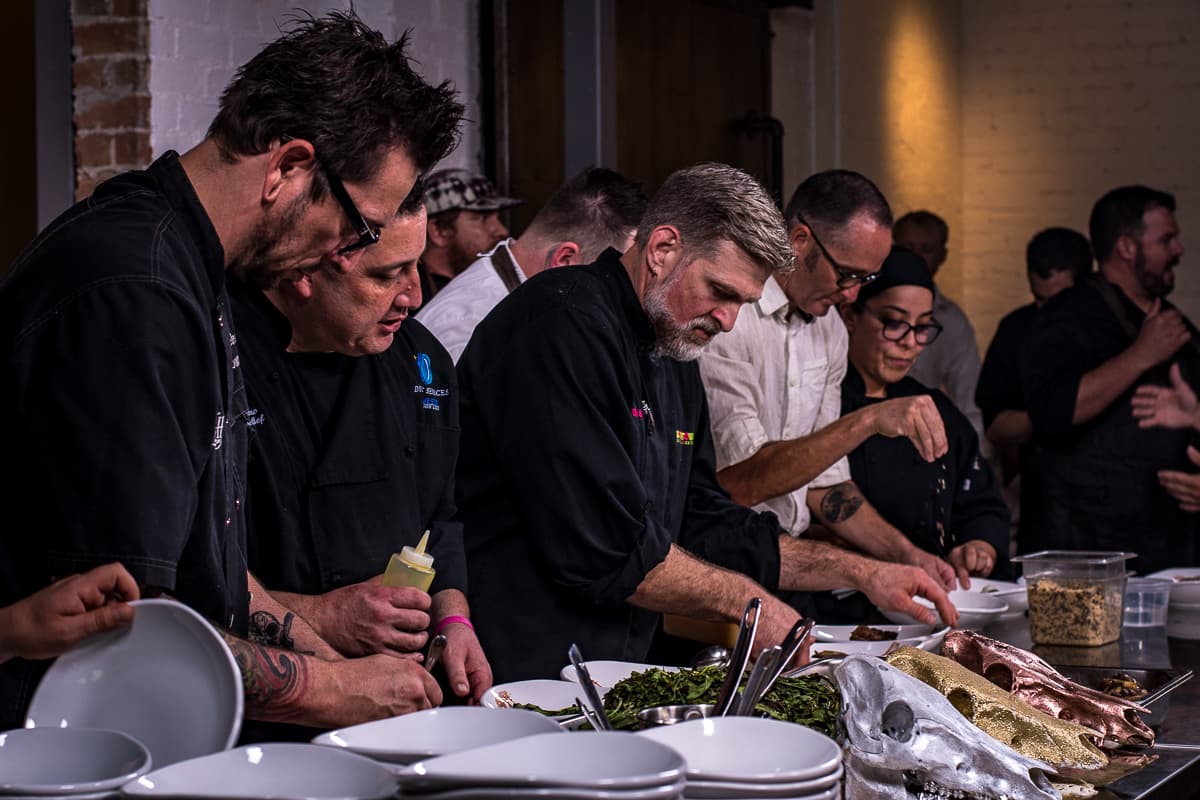 Chefs plating at a Gastronomic Union of Tucson (GUT) dinner at the Carriage House (Credit: Jackie Tran)