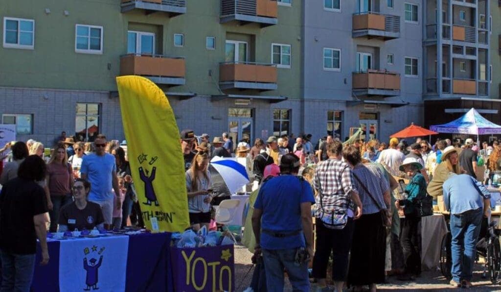a group of people standing in front of a crowd