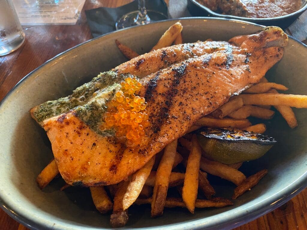 a sandwich and fries on a plate