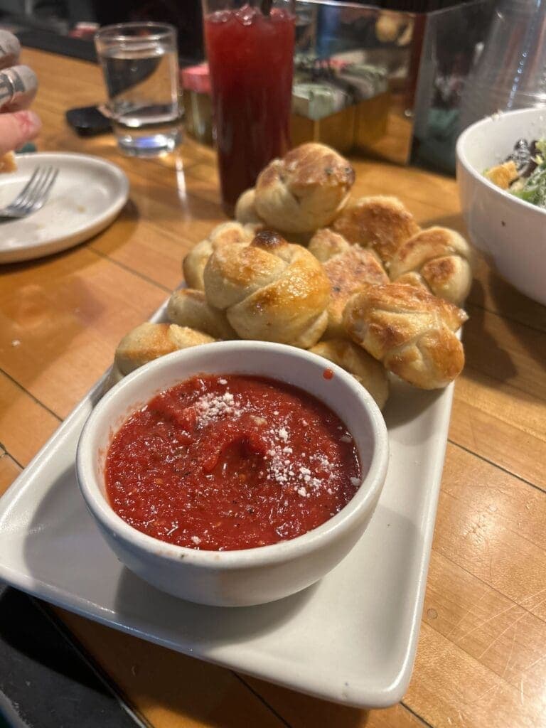a bowl of food on a plate on a table