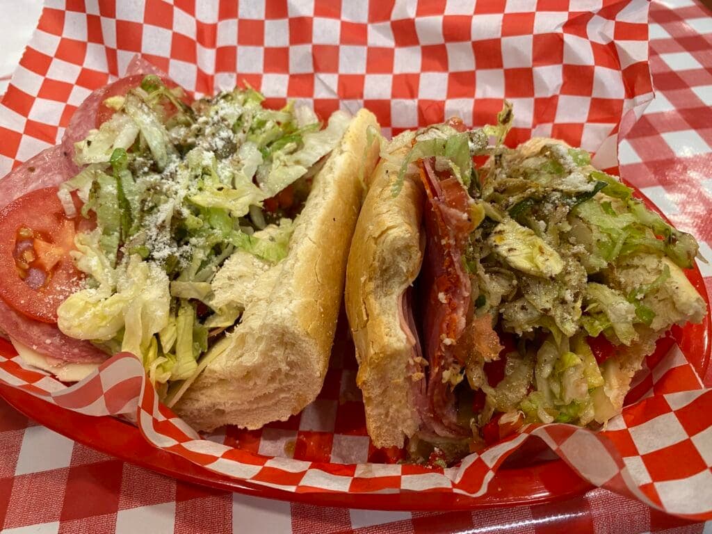 a sandwich with meat and vegetables