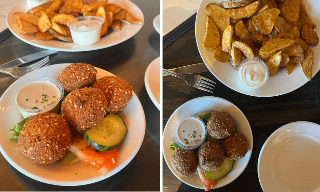 a plate is filled with different types of food on a table