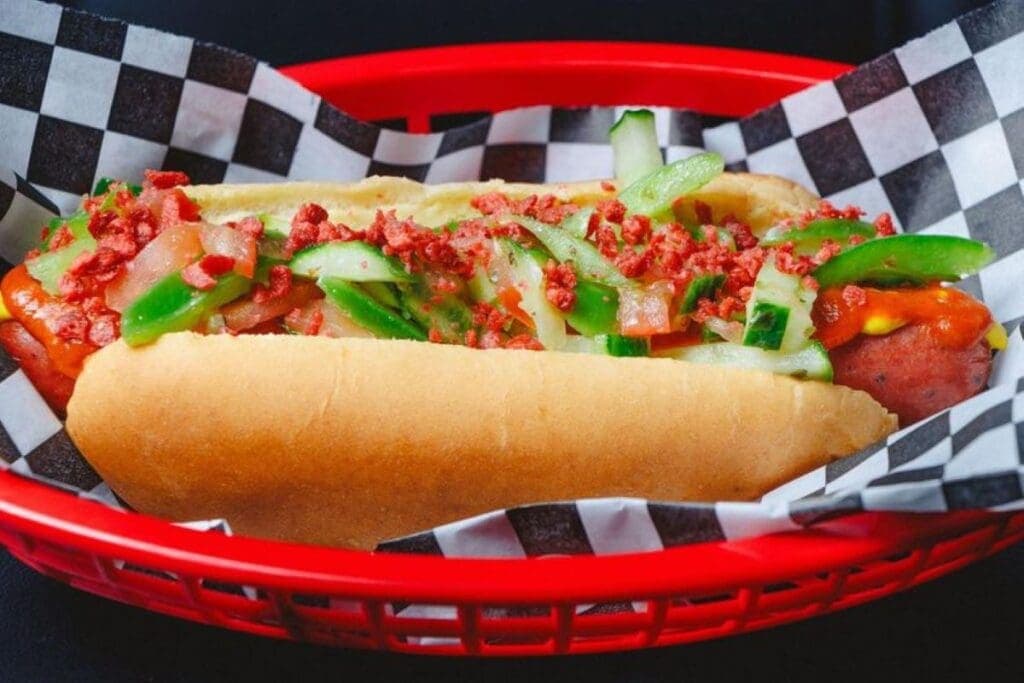 a plate of food with a hot dog