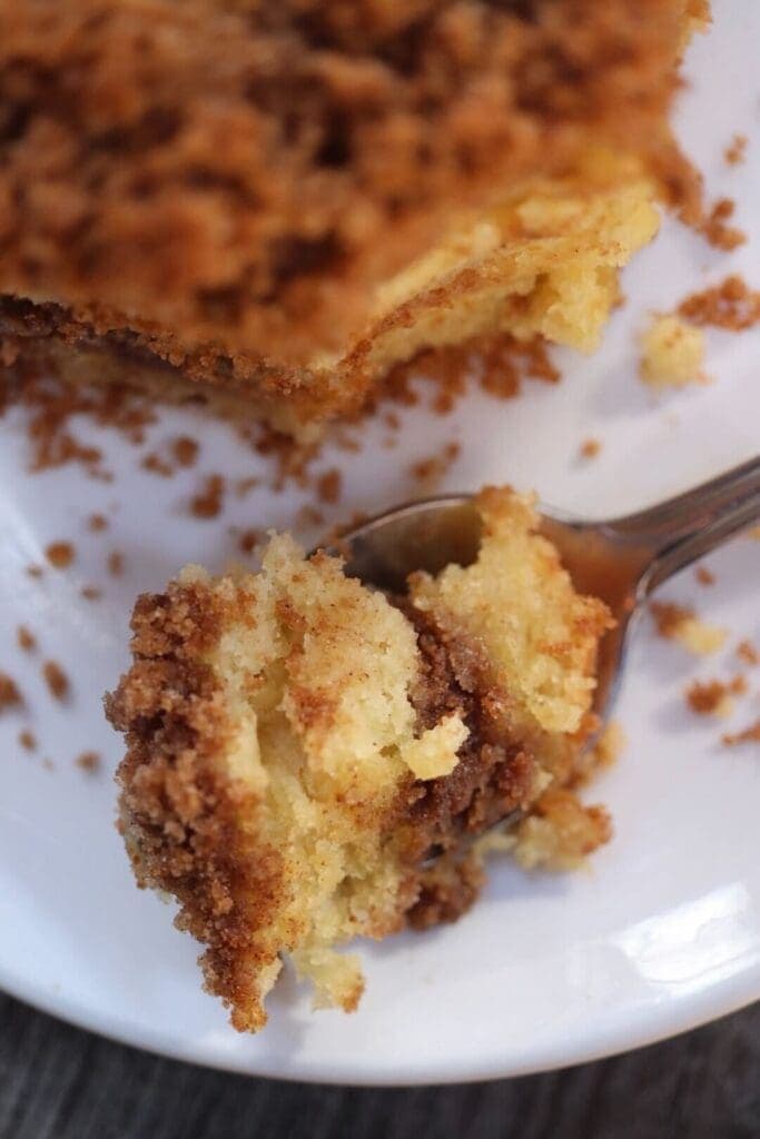 a half eaten piece of cake on a plate