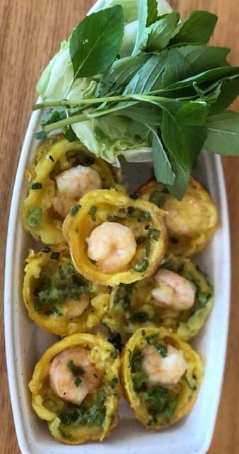 a dish is filled with food