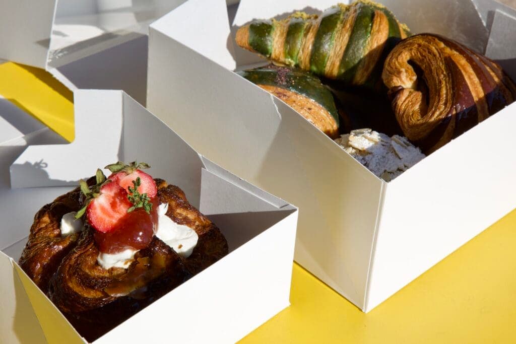 a box filled with different types of food on a table
