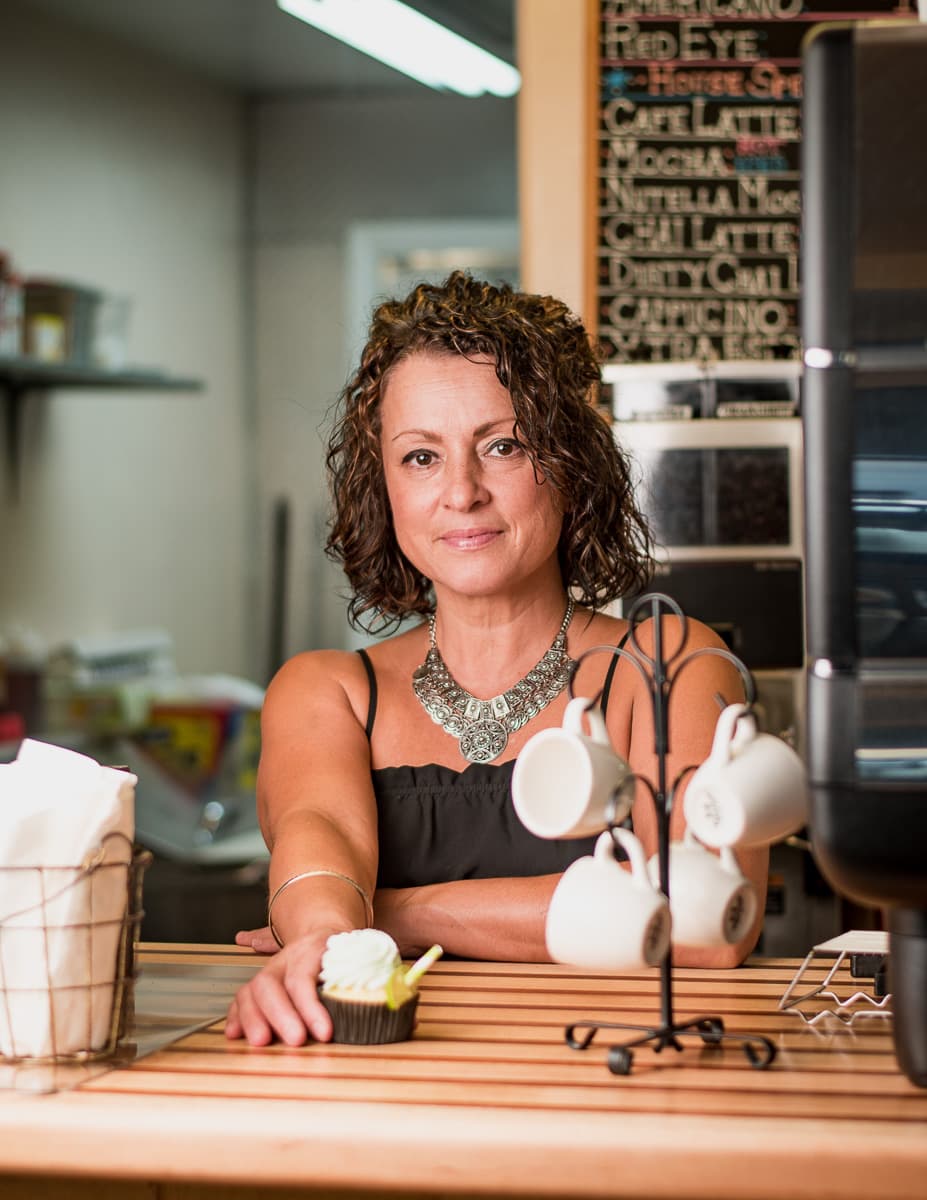 Cafe Marcel co-owner Sonia Carrington with a margarita cupcake (Credit: Jackie Tran)