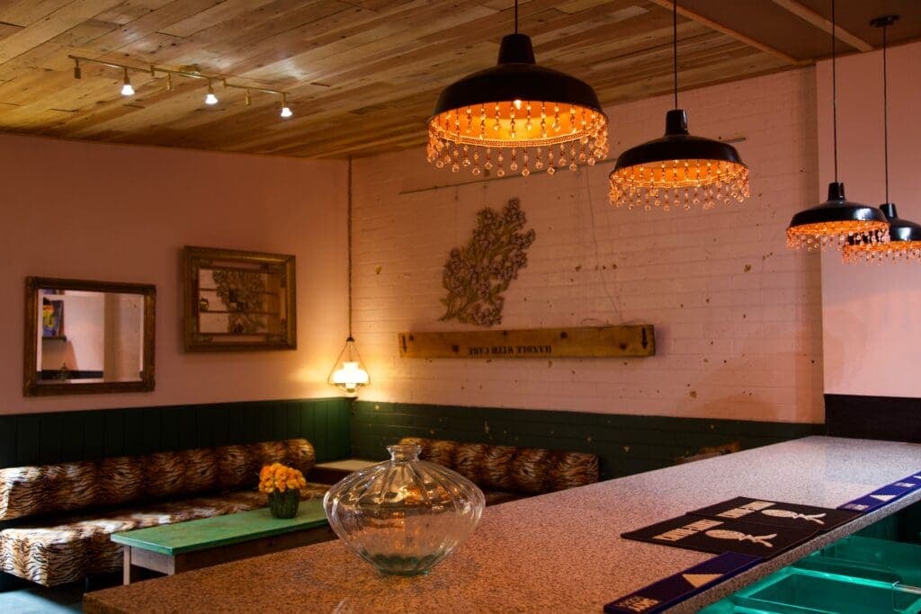 a room filled with furniture and a fire place
