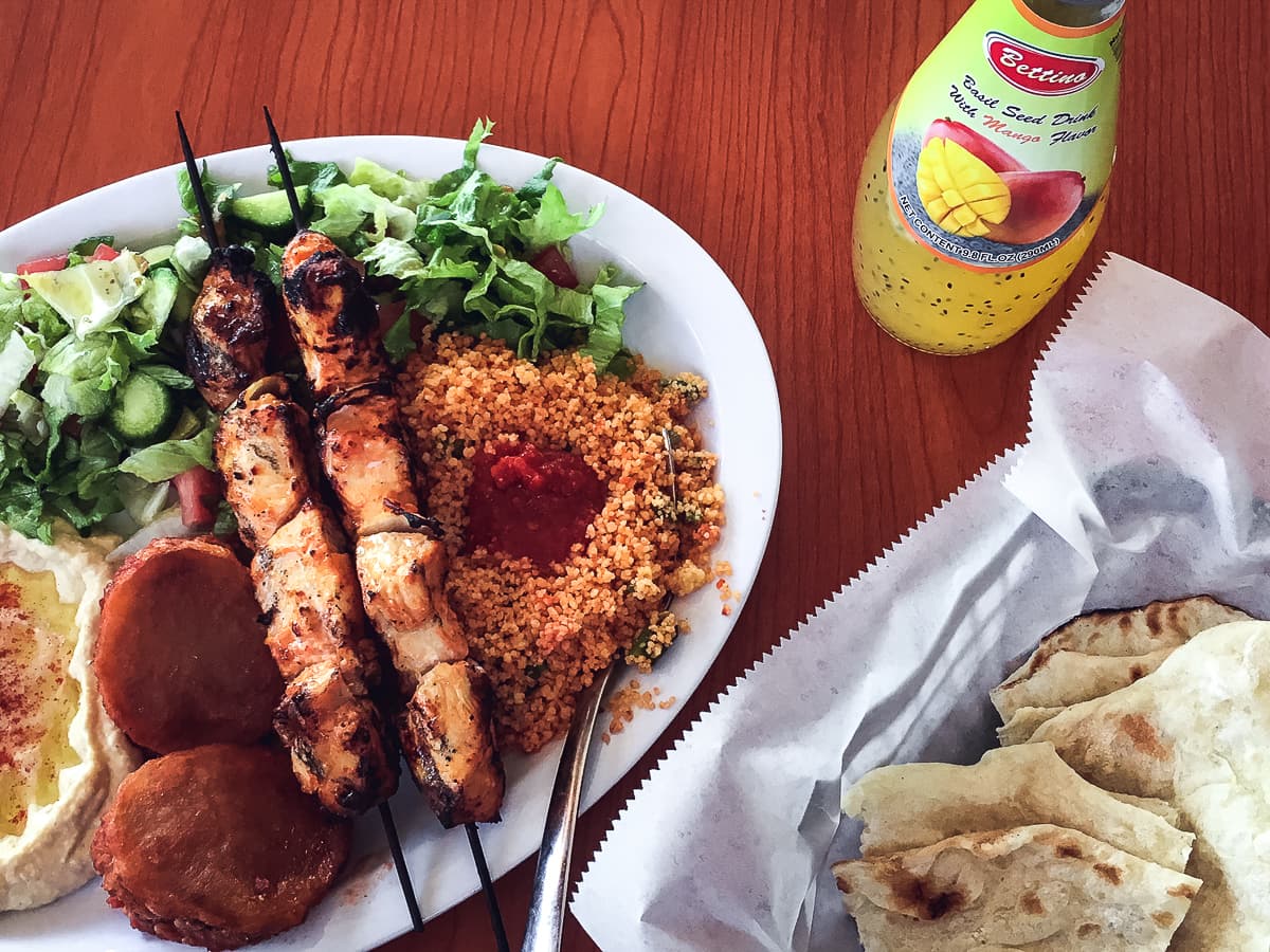 Hummus, Chicken Kebabs, and Embattan at Caravan Grill (Credit: Meredith O'Neil)