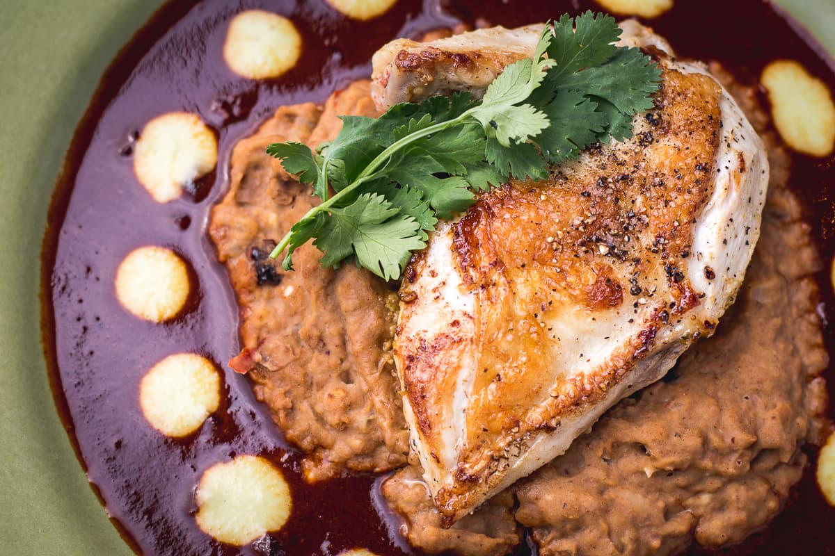 Pan-Roasted Chicken Breast Stuffed with Habanero Pepita Pesto at DOWNTOWN Kitchen + Cocktails (Credit: Jackie Tran)
