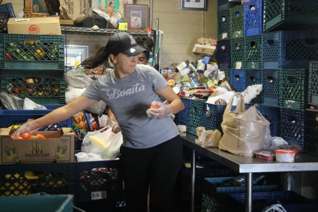 a woman standing in front of a store
