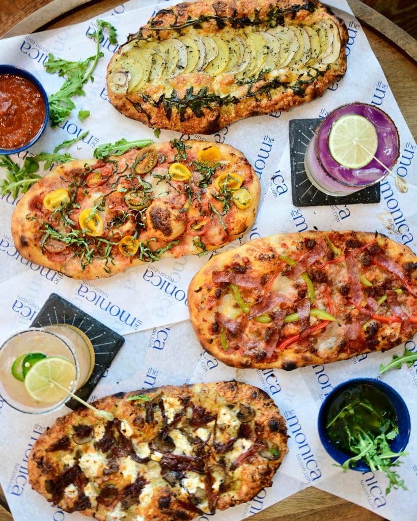 an overhead photo of flatbread pizzas