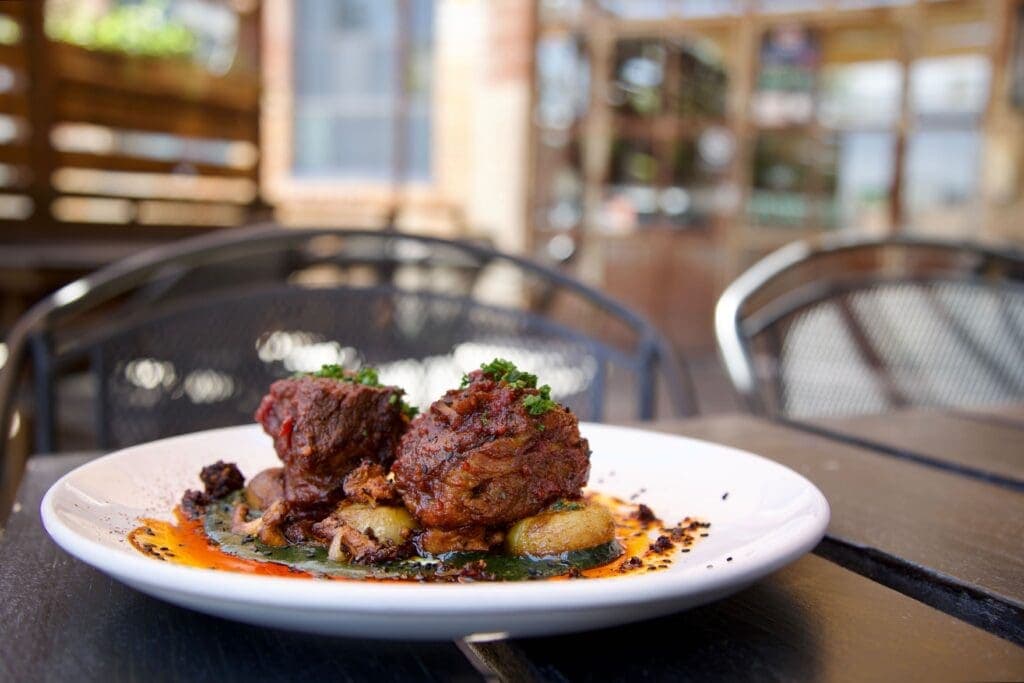 a plate of food sitting on a table