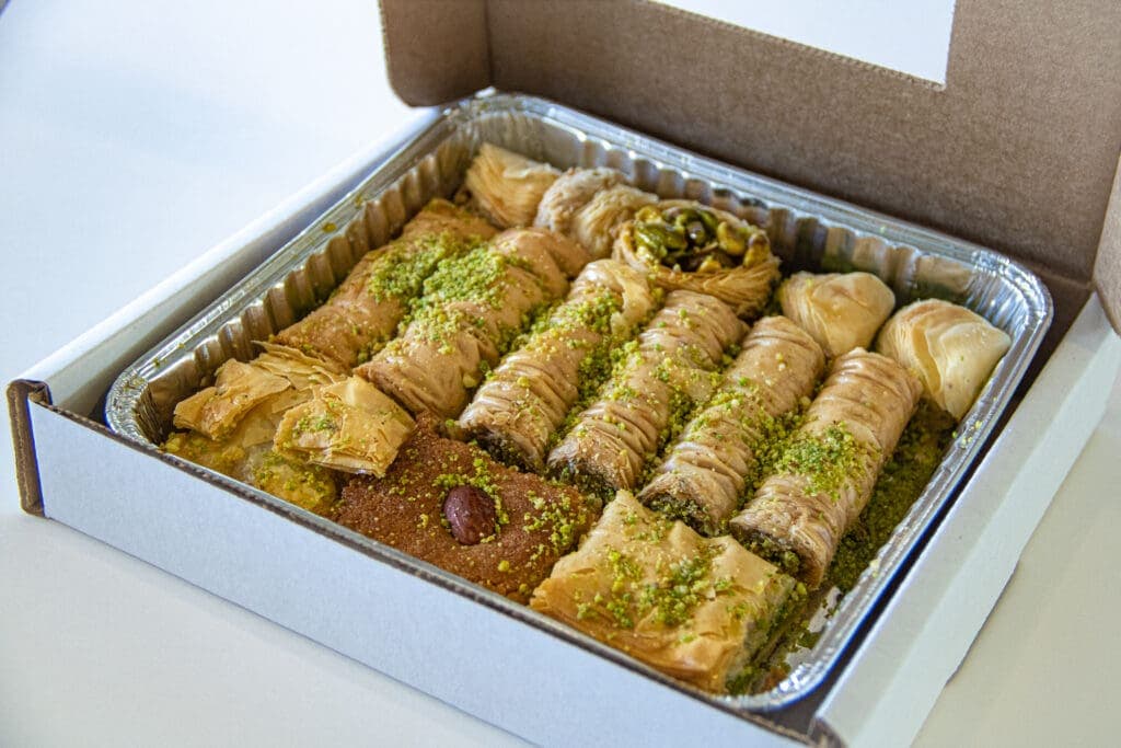 a box filled with different types of food on a table