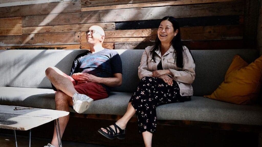 a person sitting on a bench