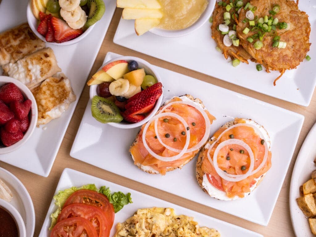 a box filled with different types of food on a plate