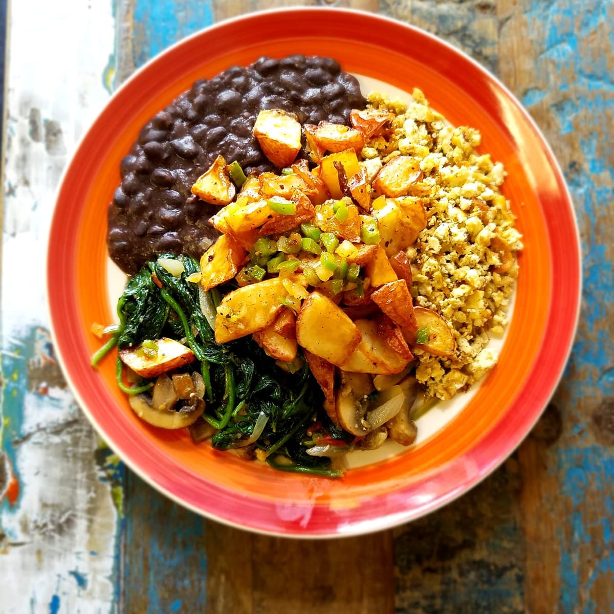 Black Beans, tofu scramble, spinach & mushrooms (Photo courtesy of Desert Island Eatery on Facebook)