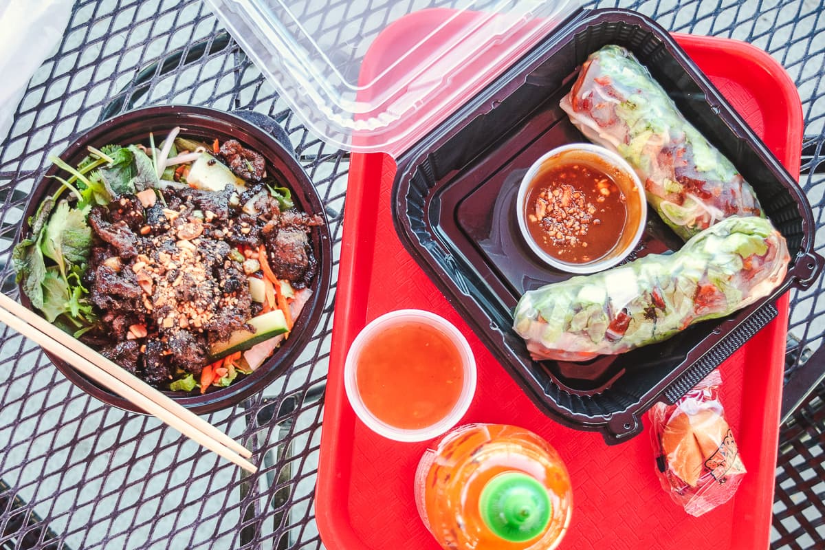 Grilled Bowl with vermicelli noodles and steak, Spring Rolls with BBQ pork at Wok Fire & Grill (Credit: Jackie Tran)