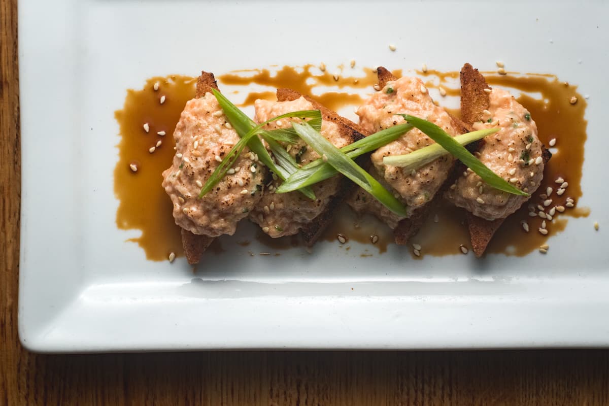Crispy Salmon Belly Toast Points at DOWNTOWN Kitchen + Cocktails (Credit: Jackie Tran)