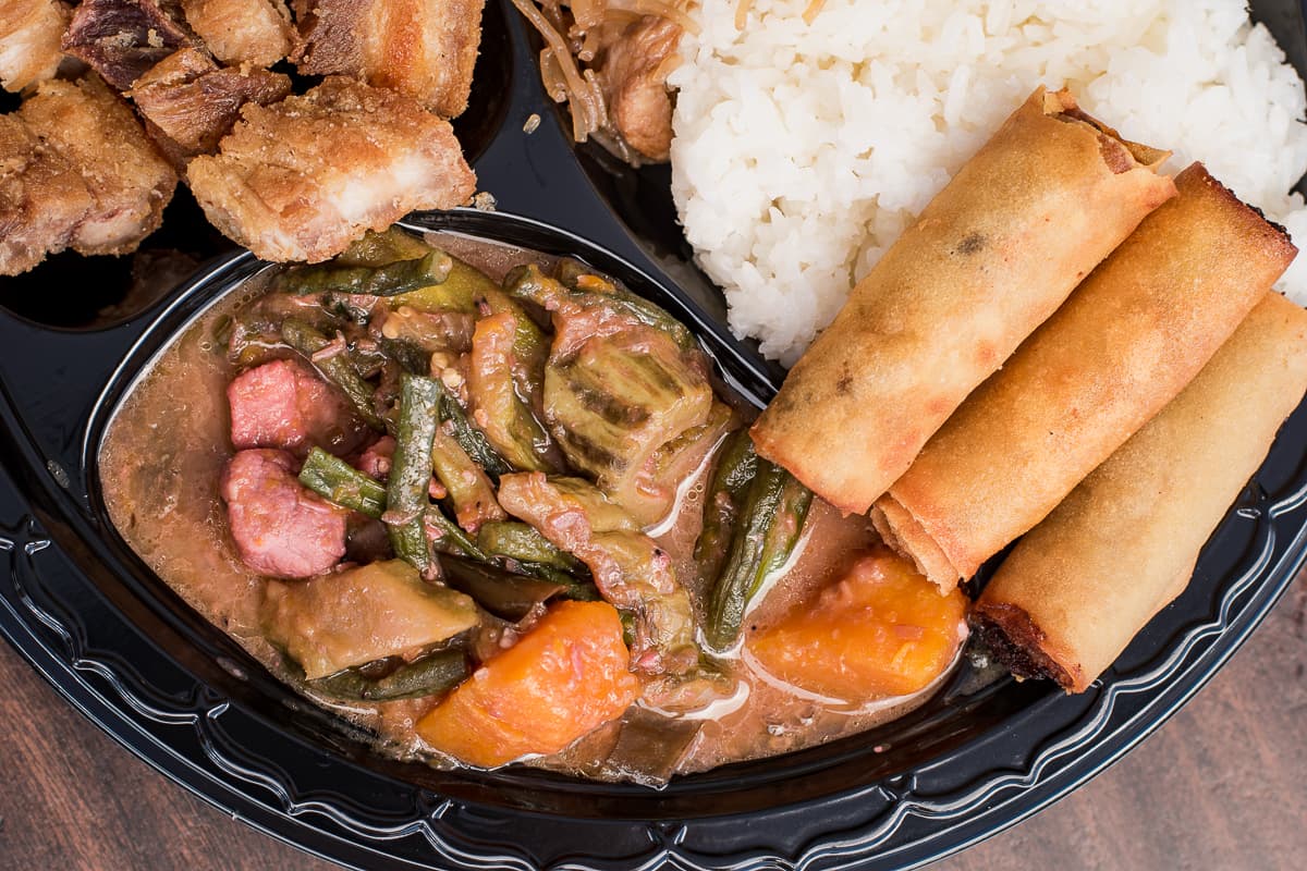 Lechon kawali, pancit, pinakbet, rice, and lumpia at Nick's Sari-Sari Store and Filipino Restaurant (Credit: Jackie Tran)