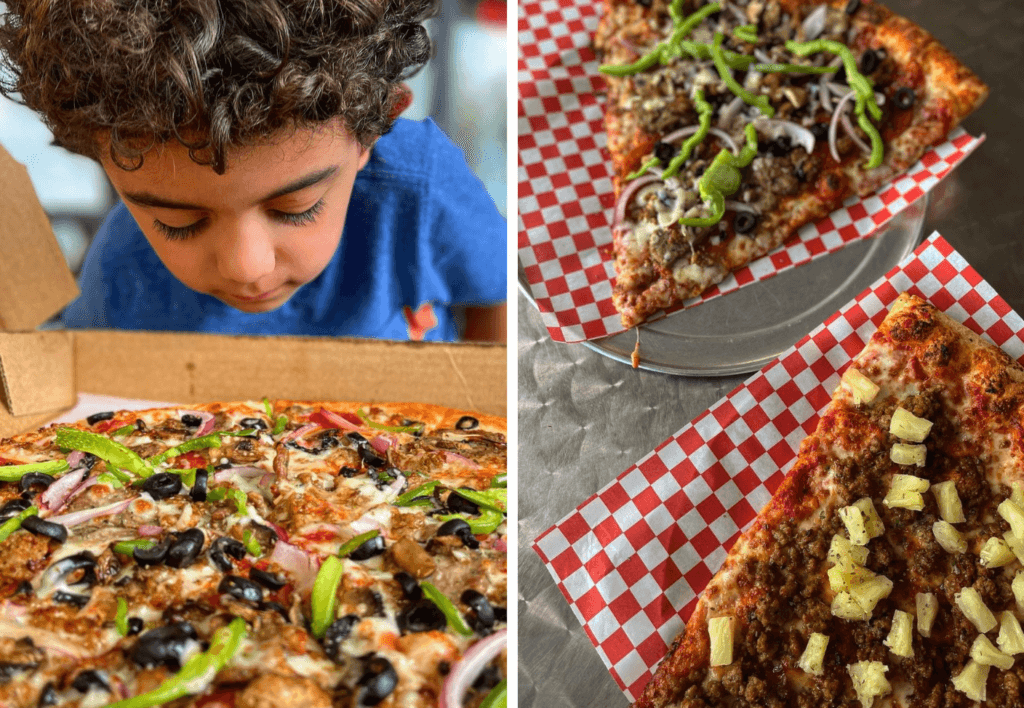 a young boy eating a slice of pizza