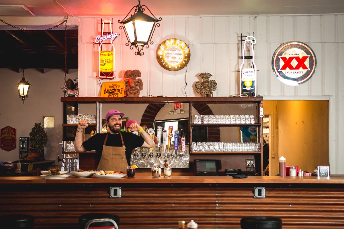 Chef Mikey Hultquist excited from happy customers at El Torero