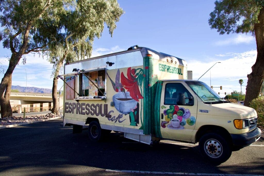 a truck is parked on the side of a road