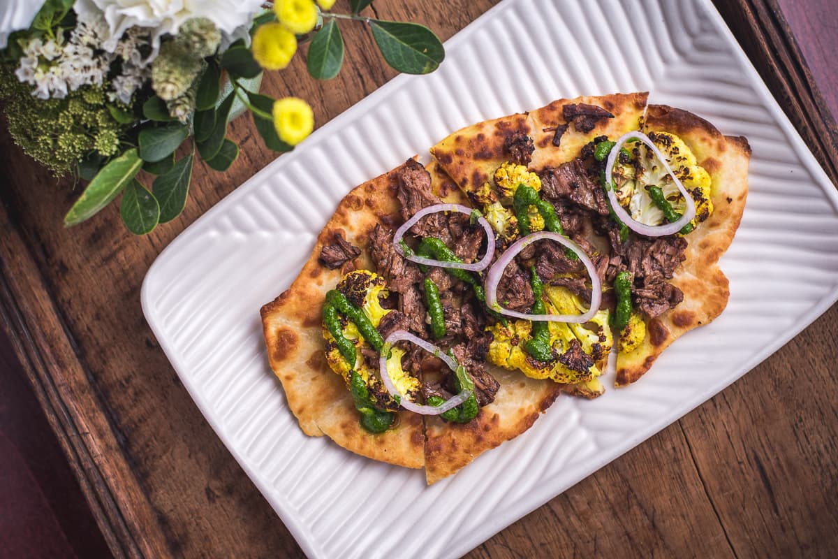 Shredded Brisket Flatbread at the Coronet (Credit: Jackie Tran)