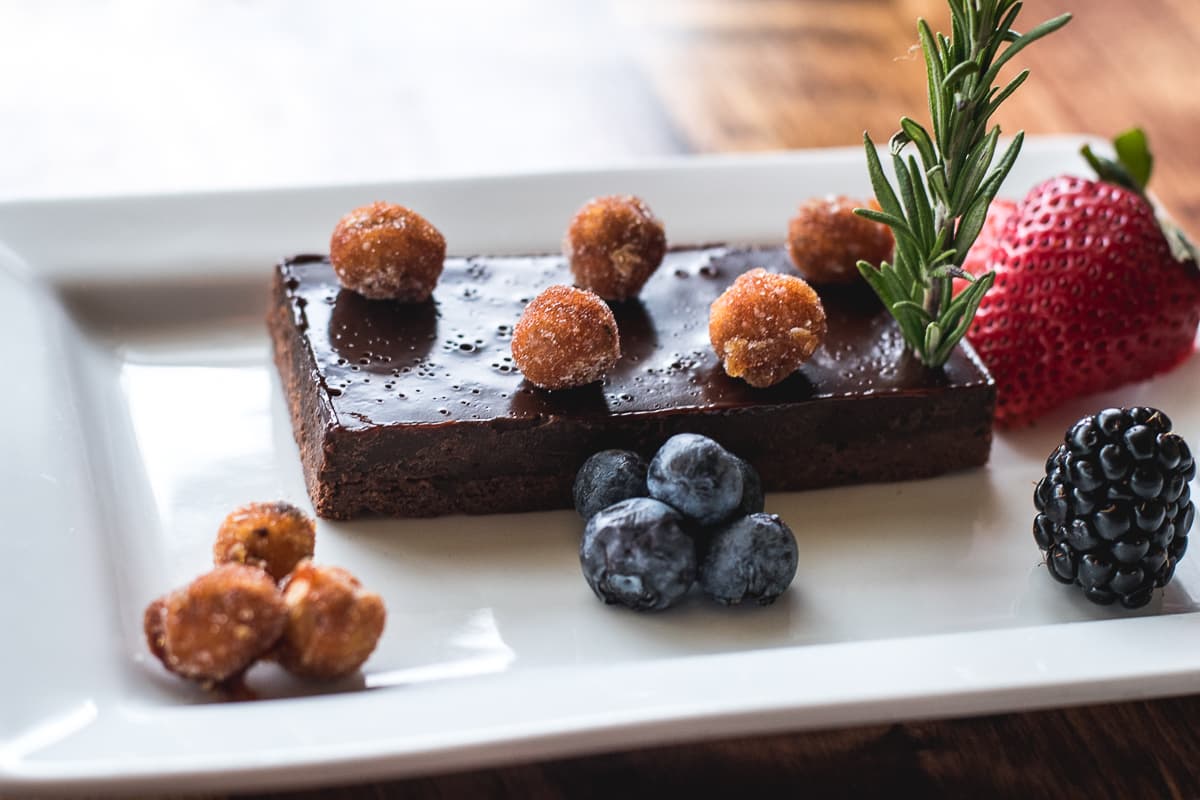 Chocolate Hazelnut Crunch bar with rosemary ganache and sweet and salty rosemary hazelnuts at Feast (Credit: Jackie Tran)