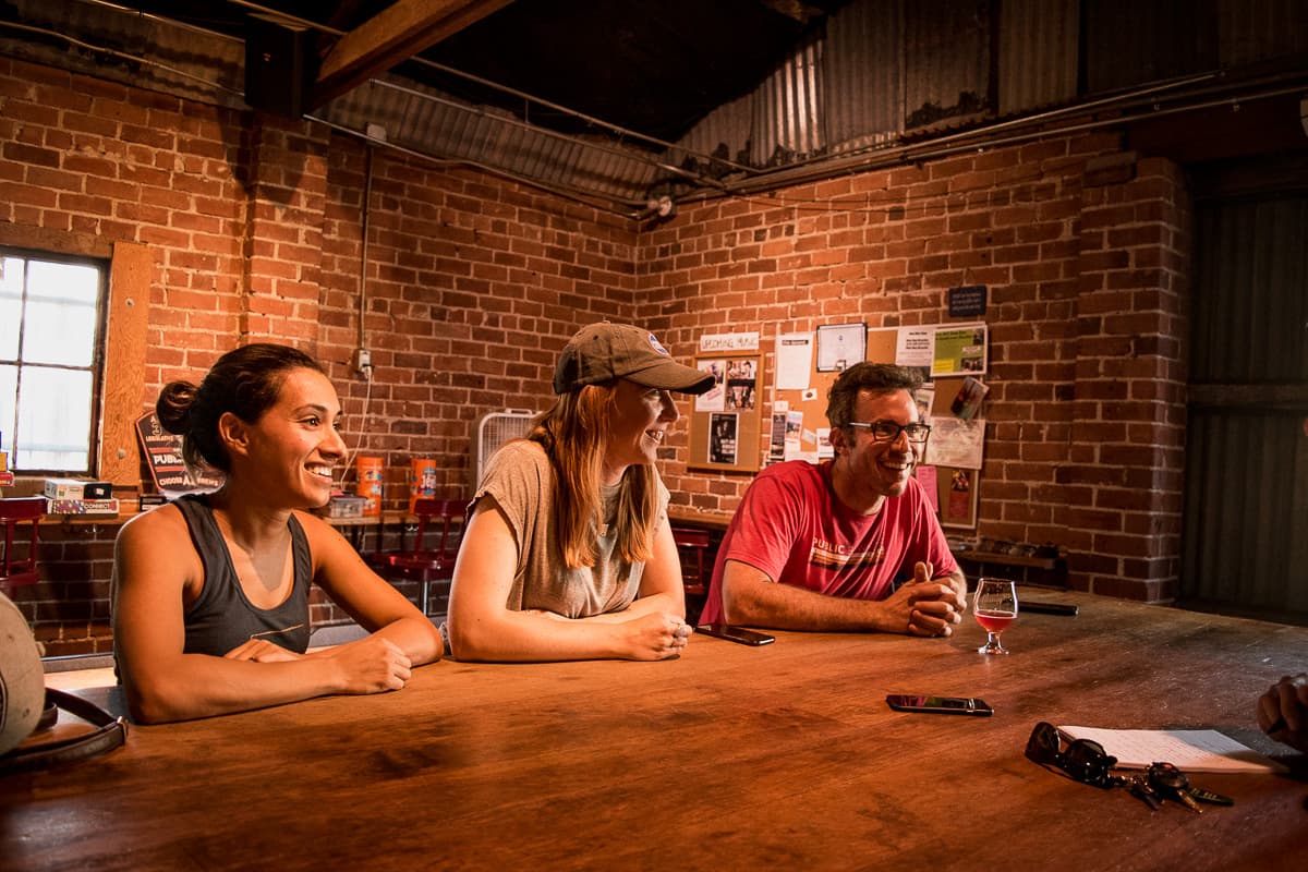 Ayla Kapahi, Grace Hargis, and Mike Gura at Public Brewhouse (Credit: Jackie Tran)