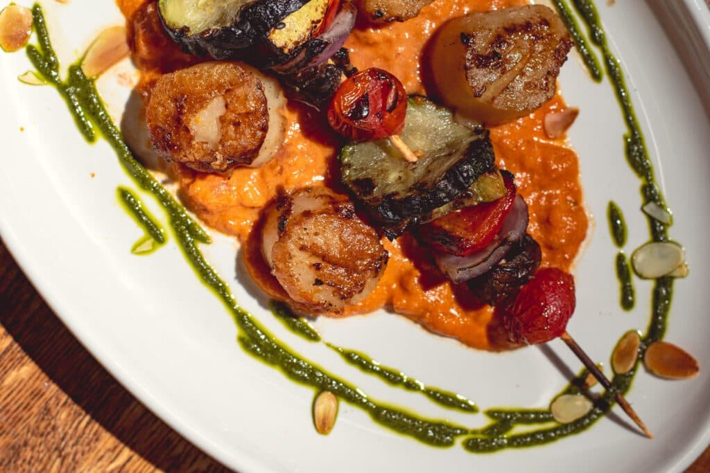 Citrus Herb Scallops at Figs Oven + Enoteca (Photo by Jackie Tran)