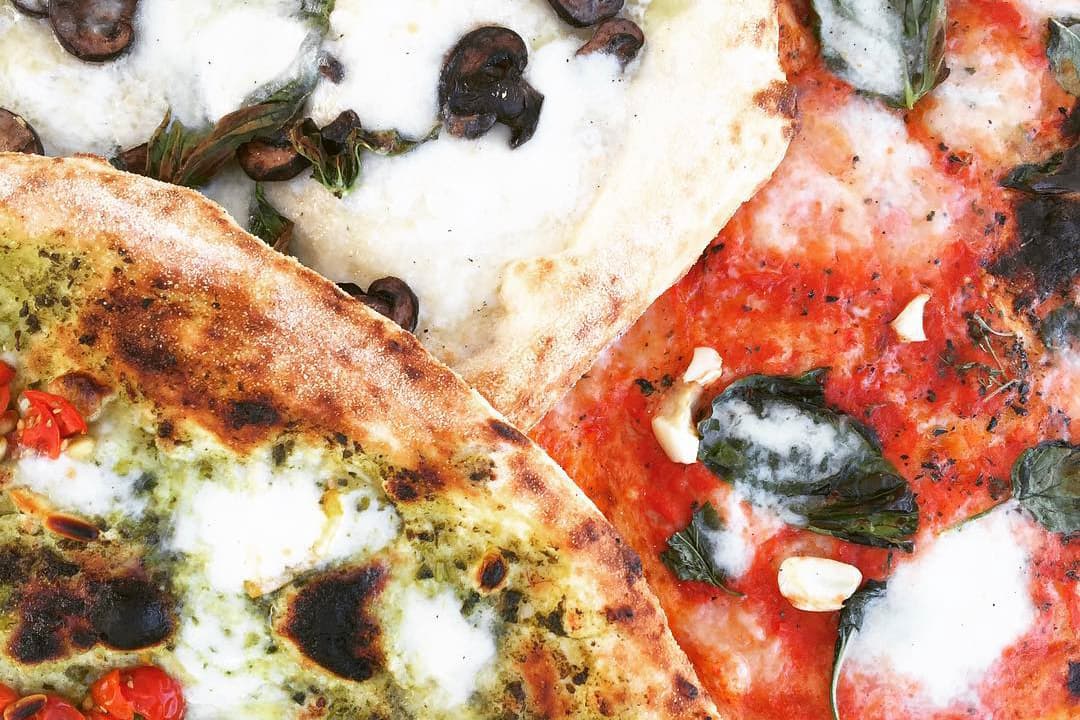 Trio of pizzas from Fiamme Pizza Napoletana (Credit: Adam Lehrman)