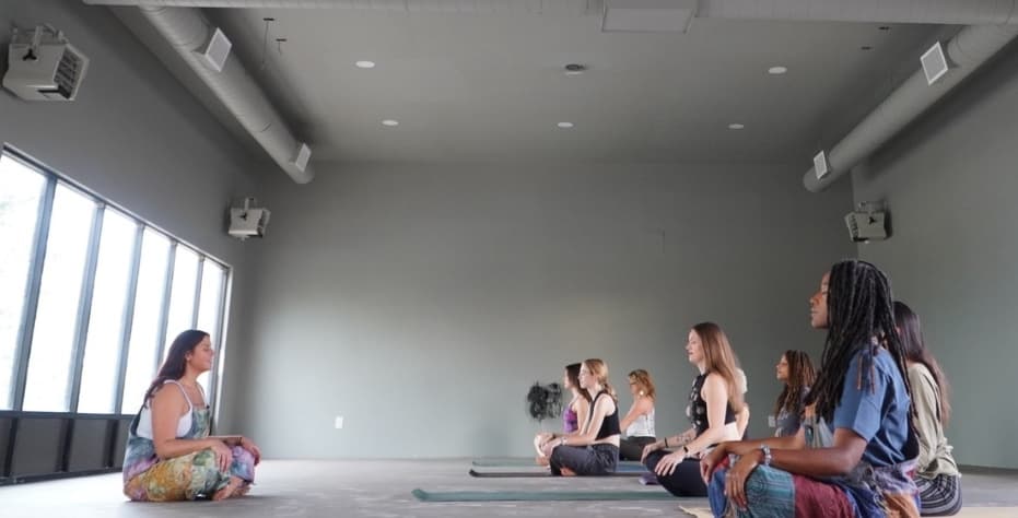 a group of people sitting in a room
