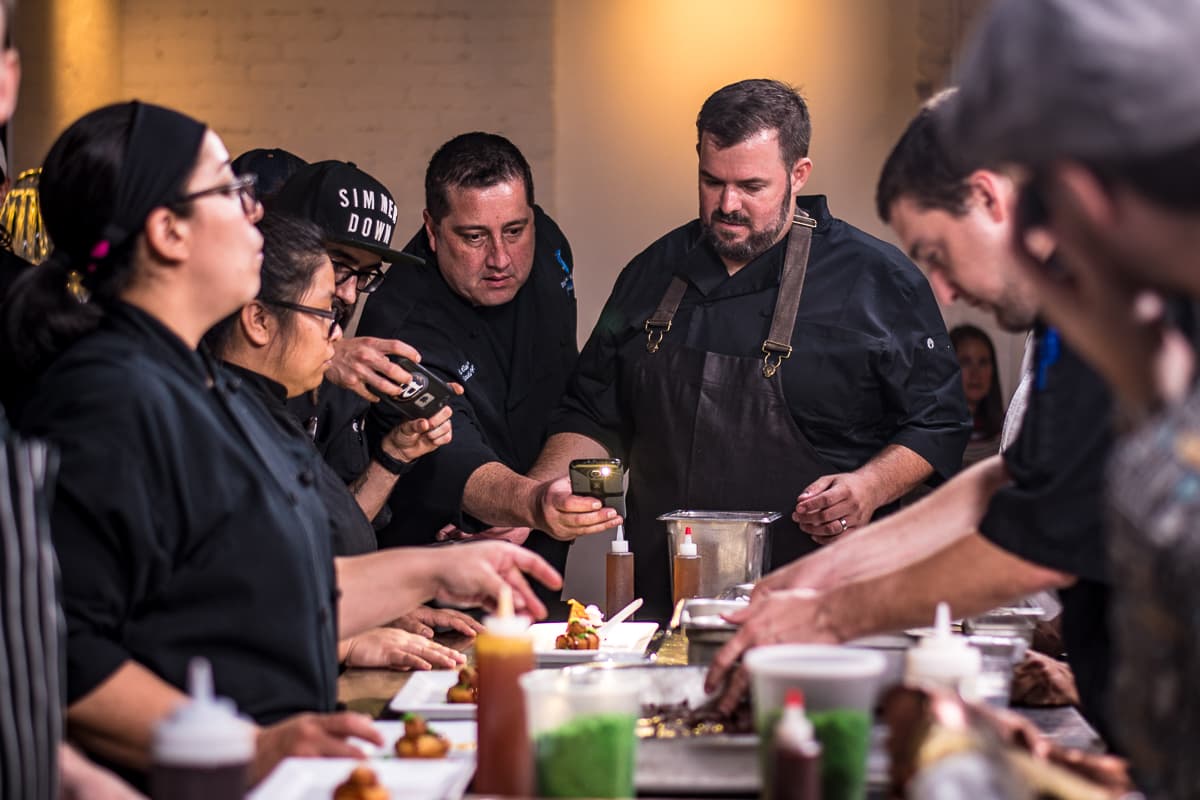 Chefs plating at a Gastronomic Union of Tucson (GUT) dinner at the Carriage House (Credit: Jackie Tran)