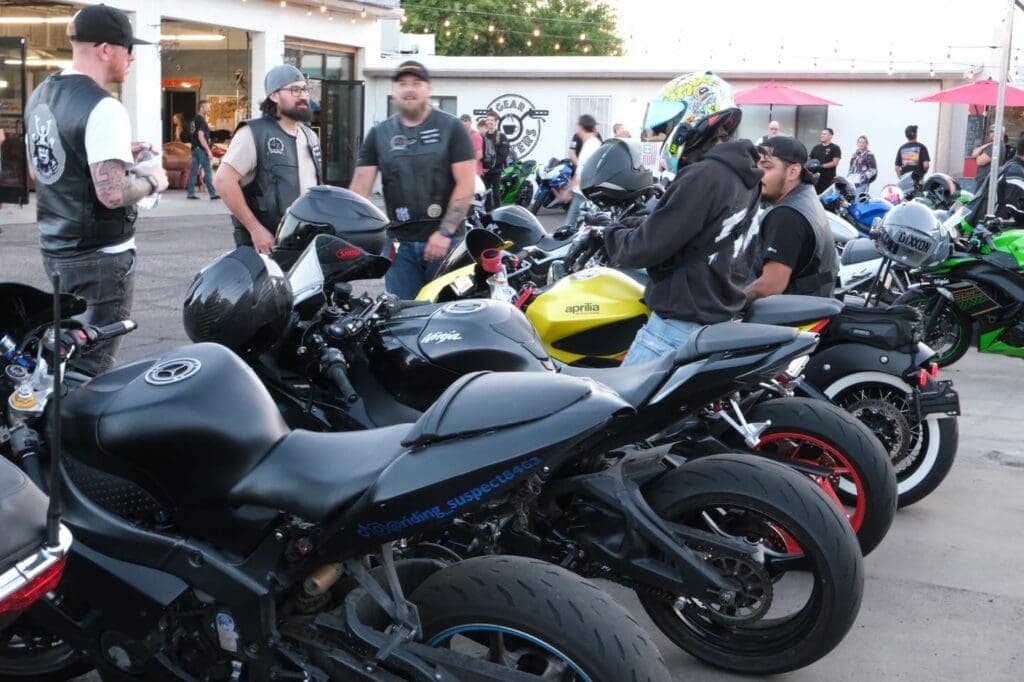 a motorcycle parked in front of a crowd
