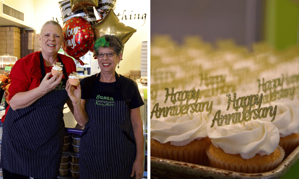 a person standing in front of a cake