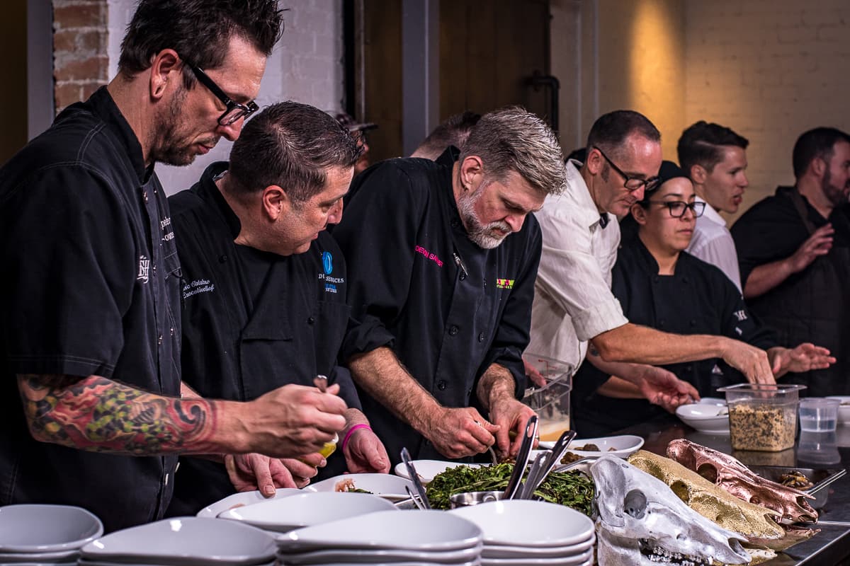 Chefs plating at a Gastronomic Union of Tucson (GUT) dinner at the Carriage House (Credit: Jackie Tran)