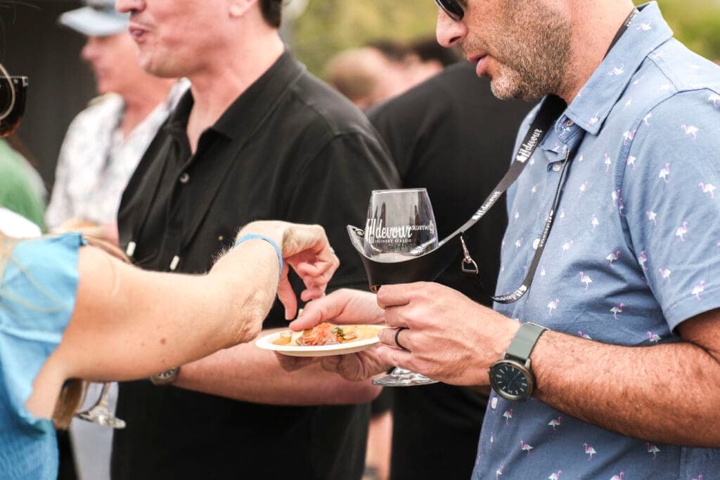 a man holding a wine glass