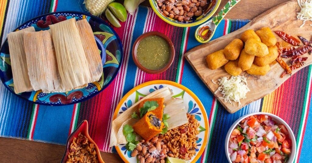 a plastic container filled with different types of food on a table