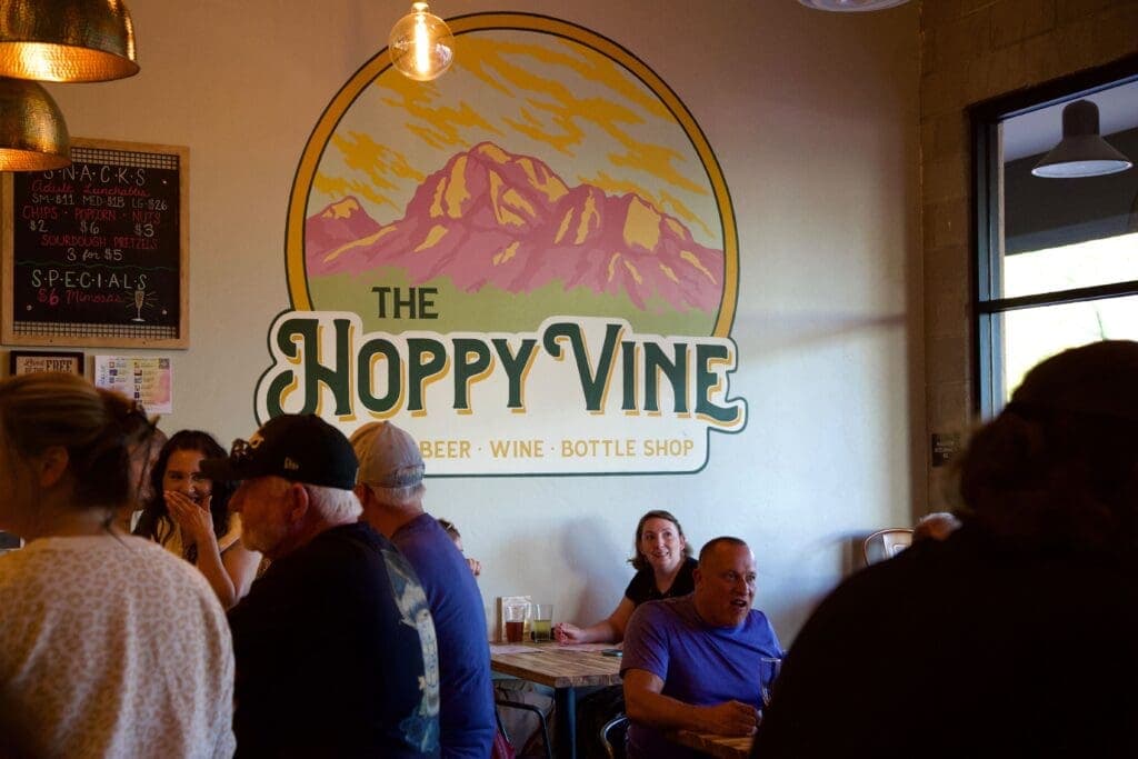 a group of people sitting in a restaurant