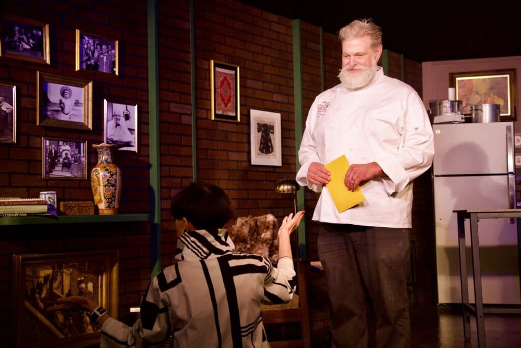 a man standing in a kitchen