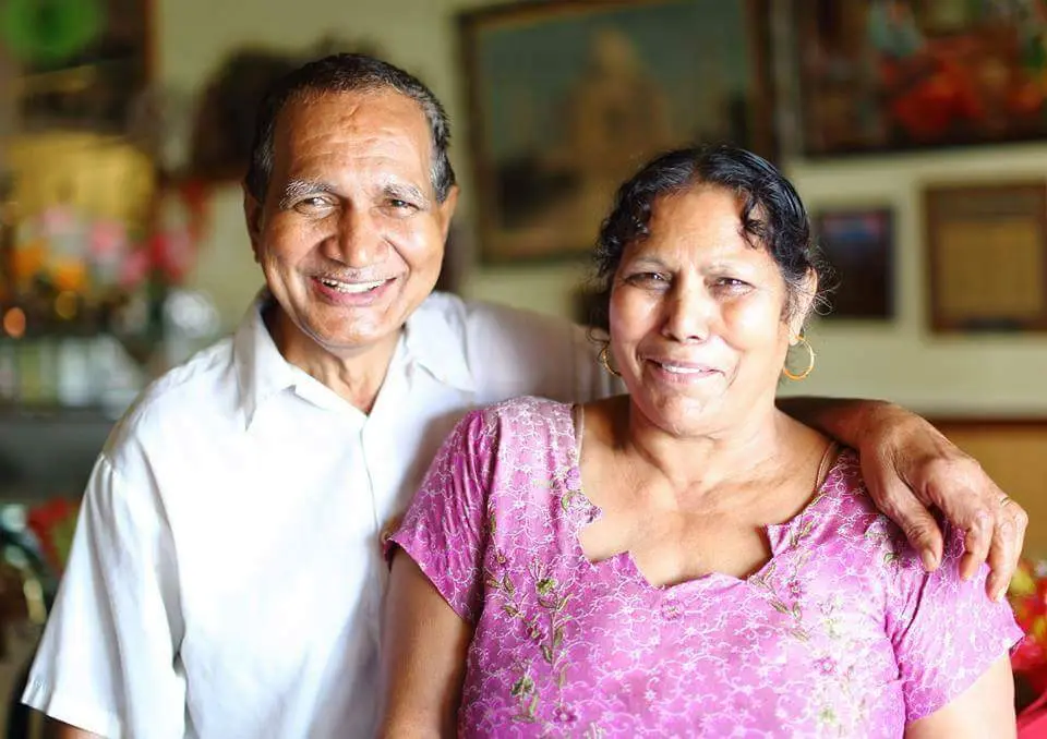 a man and a woman posing for a picture