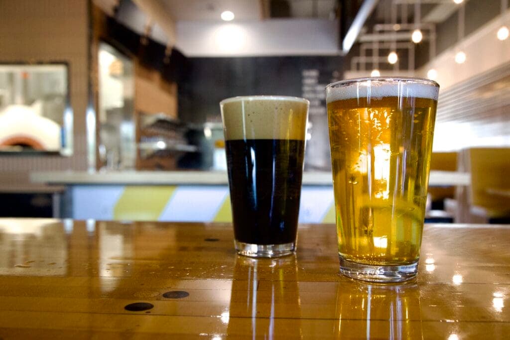 a glass of beer on a table