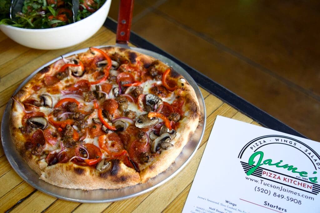 a pizza sitting on top of a table