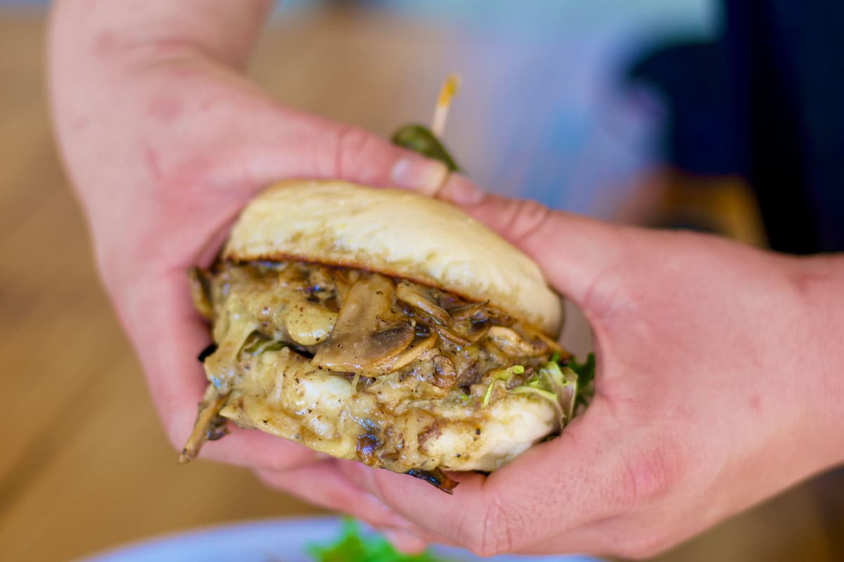January's Juicy Mushroom French Peppercorn Sauce Burger at Ghini's French Caffe