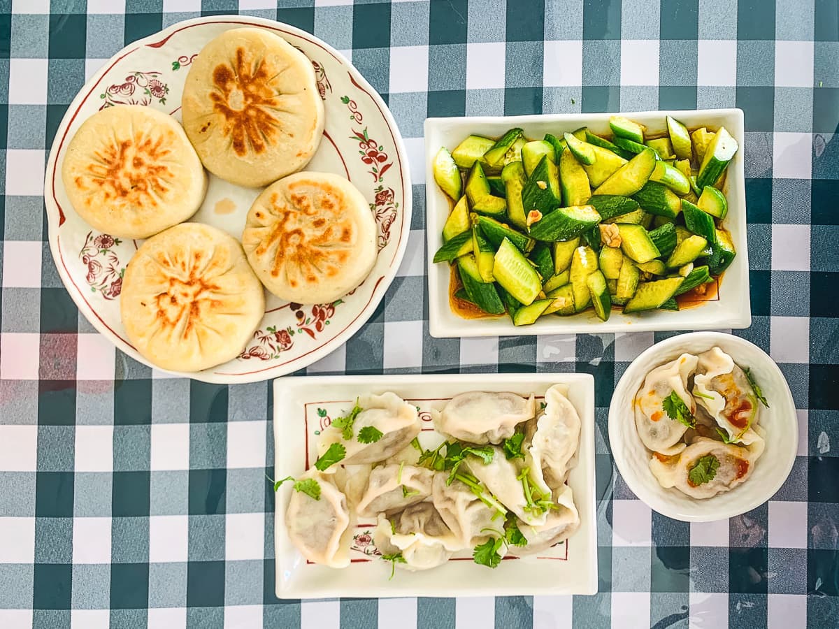 Pork with Scallion Pie, Cold Cucumber Salad, and Dumplings at Jewel's Noodle Kitchen